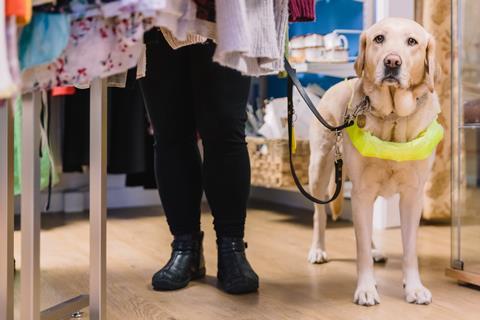 Guide dog owner shopping