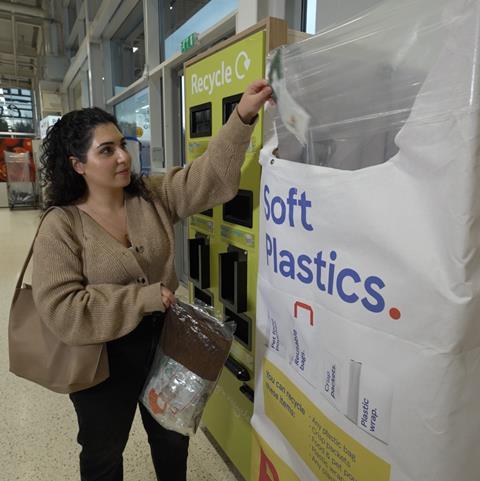 Shopper recycling soft plastic tesco