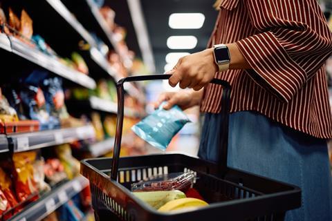 woman filling shopping basket