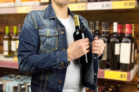 shoplifting stealing steal wine alcohol crime