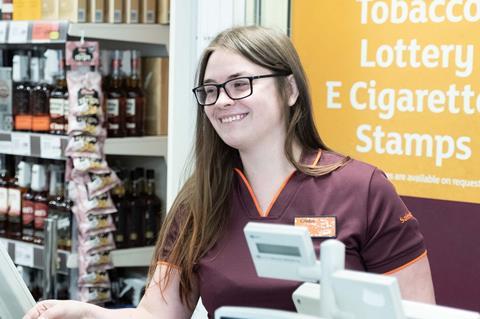 sainsburys checkout staff and customer