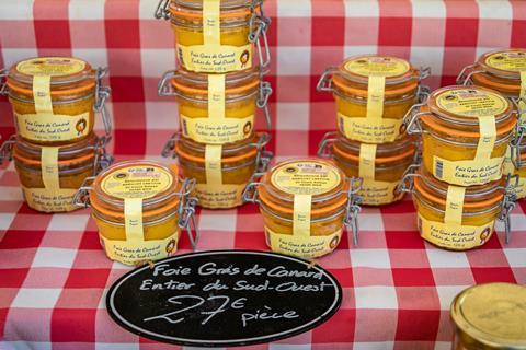 Foie gras, whole duck liver at a specialty stand, farmers market in Nice, France
