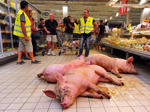 pig in supermarket protest one use