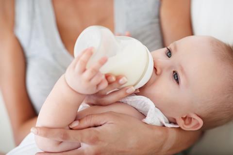 Baby drinking from bottle