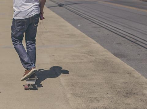 Teenager skateboarding