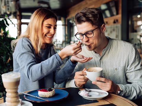 couple in cafe coffee and cake