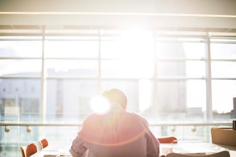 man in meeting room mental health