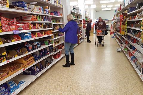 shopper sainsburys confectionery aisle