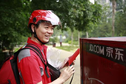 JDom-CEO-Richard-Liu-delivering-orders-on-June-18-the-companys-anniversary