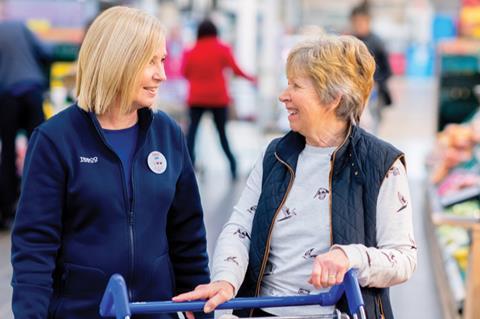 Tesco staff and customer