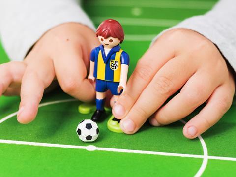 Child playing table football_World cup