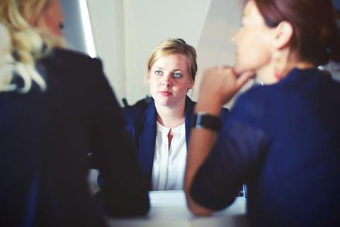 Three women in a business meeting