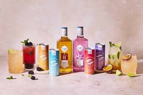 A line up of cocktails alongside bottles of CleanCo and cans of Goodrays