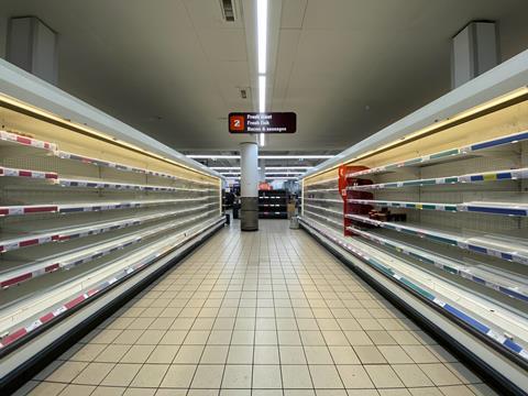 empty shelves sainsbury's aisle