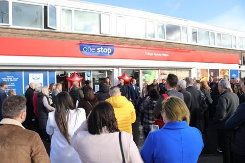 Local community gathers outside 1000th Store