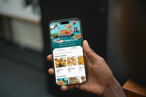 Free Hand Holding iPhone 16 Pro Mockup