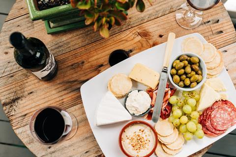 cheese and wine olives grapes cheeseboard