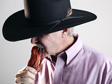 cowboy eating jerky