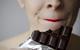 woman eating chocolate